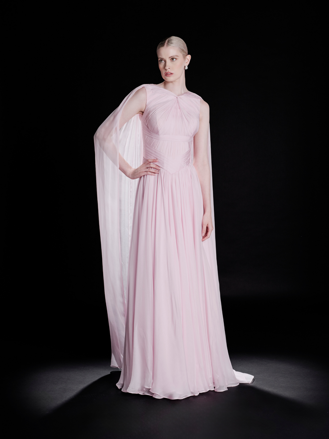 Look 26 – Elegant Soft Pink Draped Gown with Cape