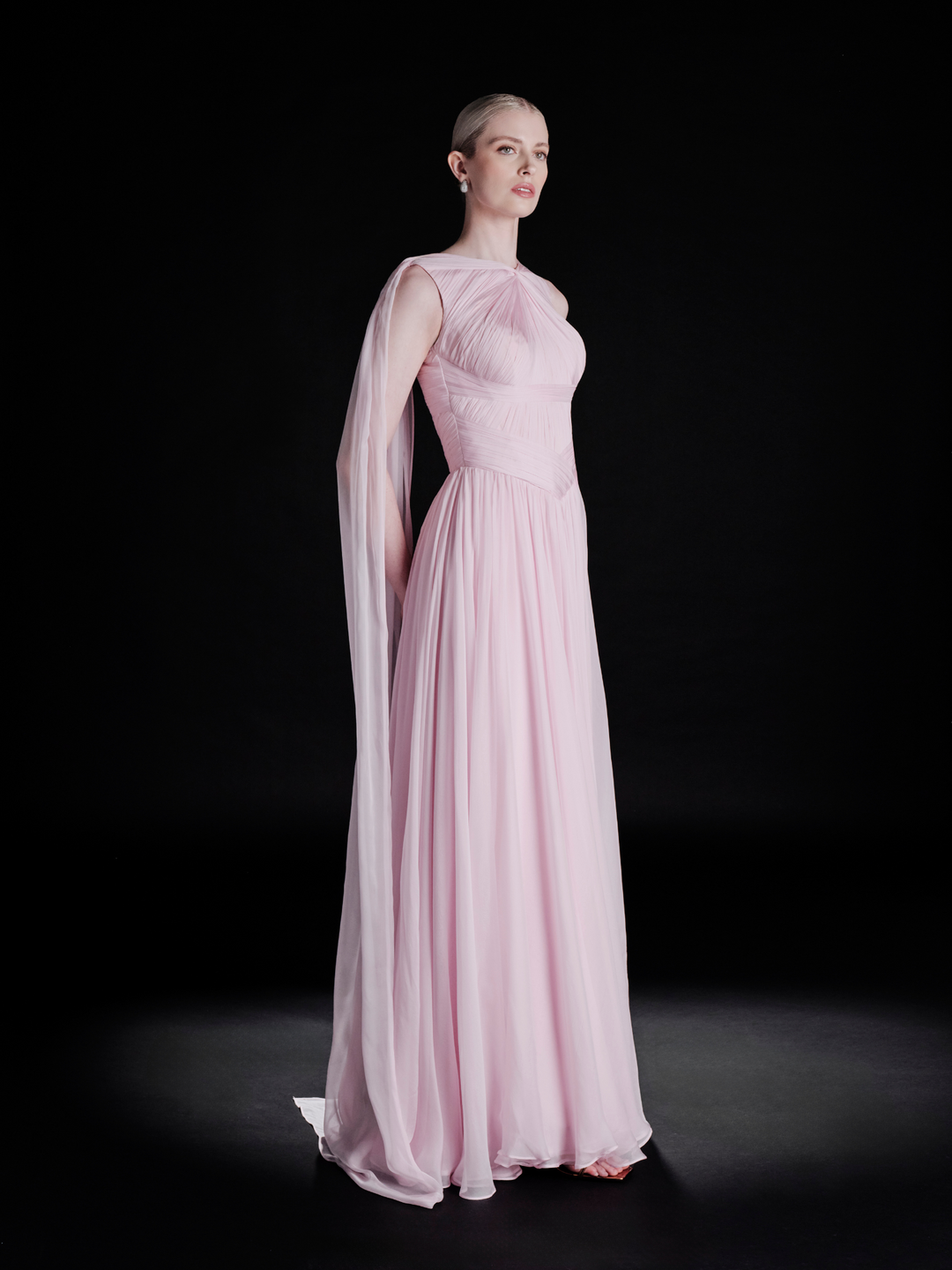 Look 26 – Elegant Soft Pink Draped Gown with Cape