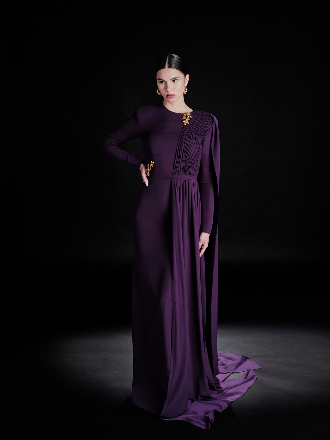 Look 31 – Regal Purple Draped Gown with Gold Embellishments