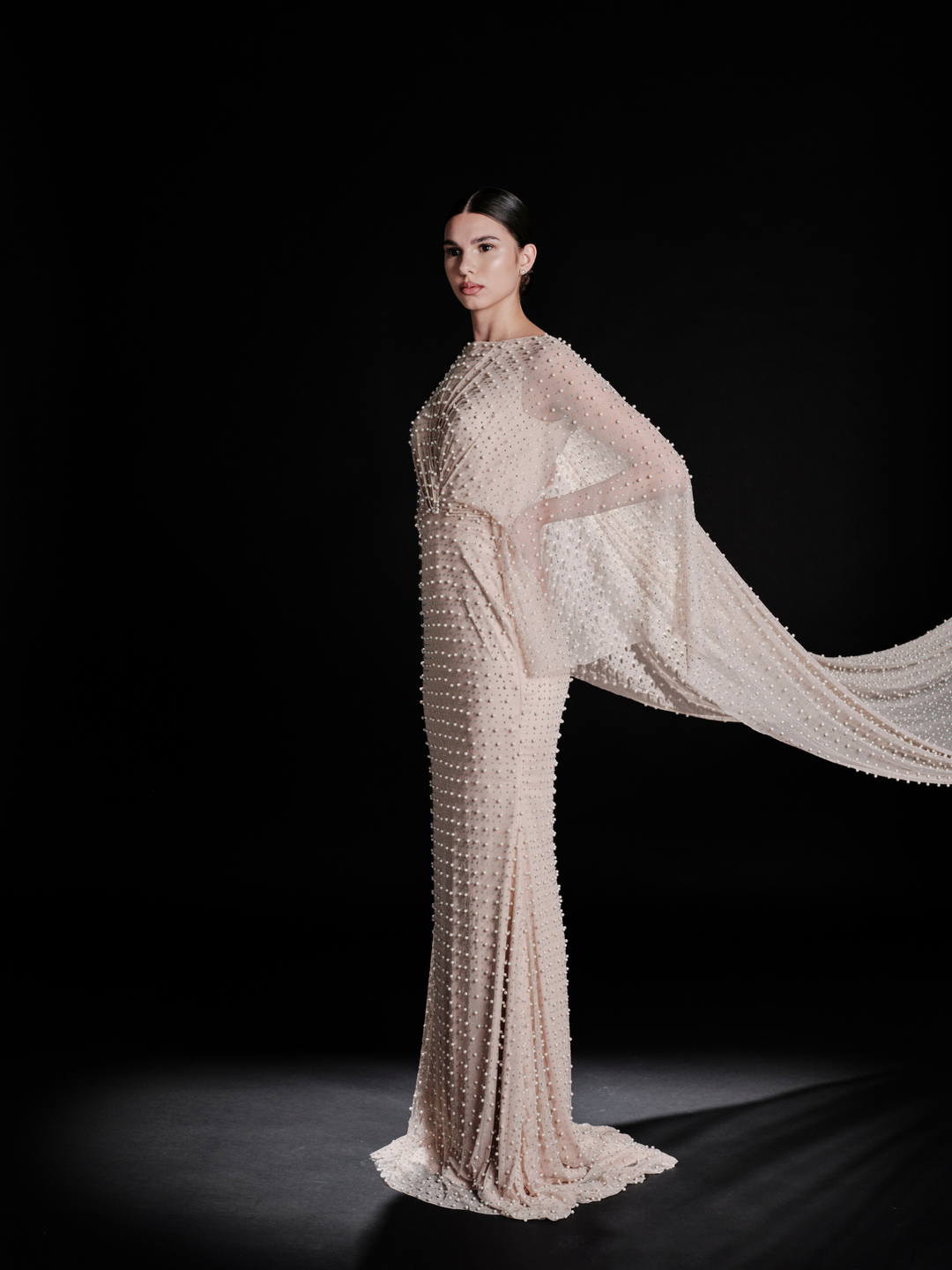 Look 35 – Champagne Pearl-Embellished Gown with Draped Silhouette