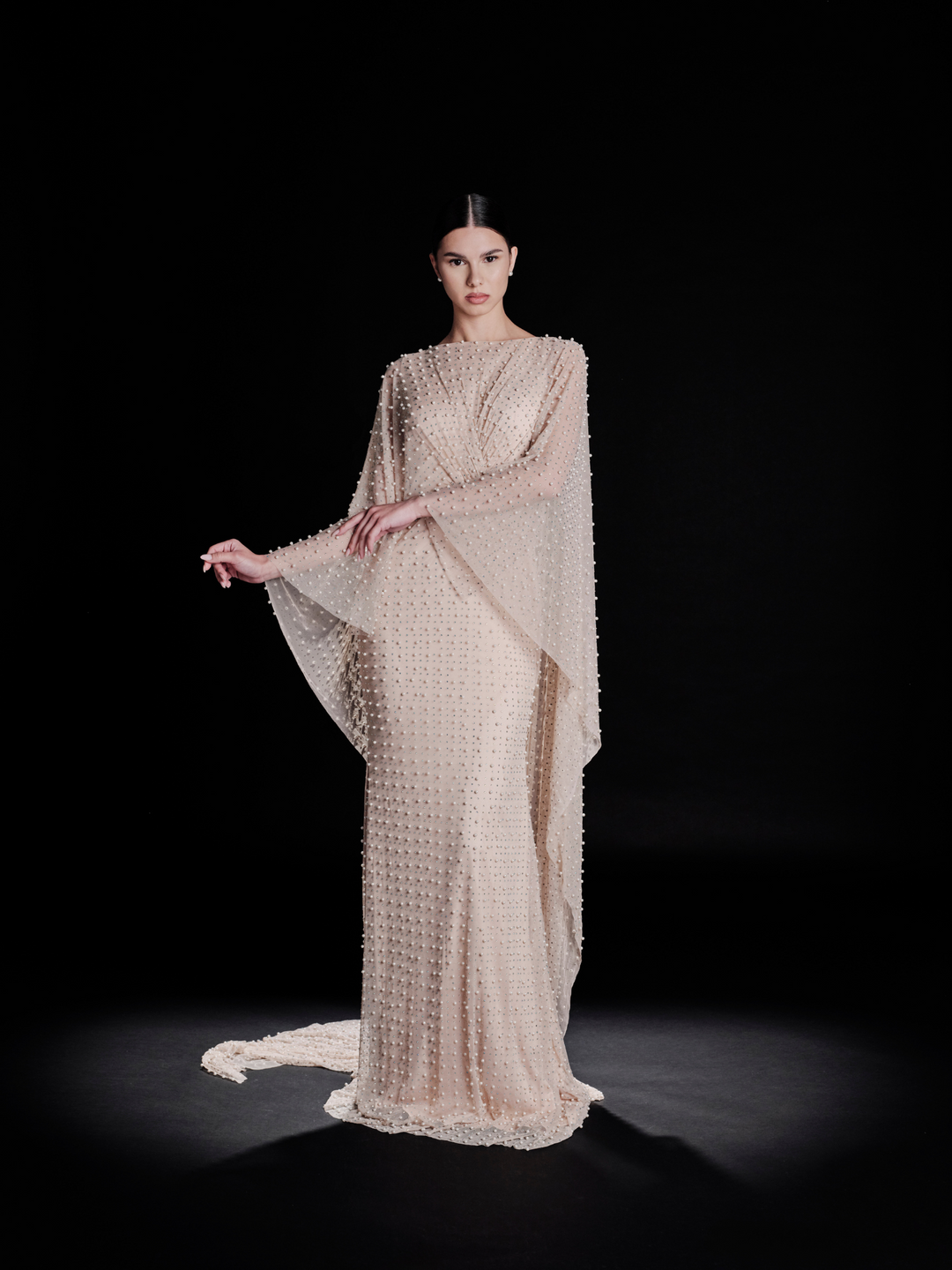 Look 35 – Champagne Pearl-Embellished Gown with Draped Silhouette