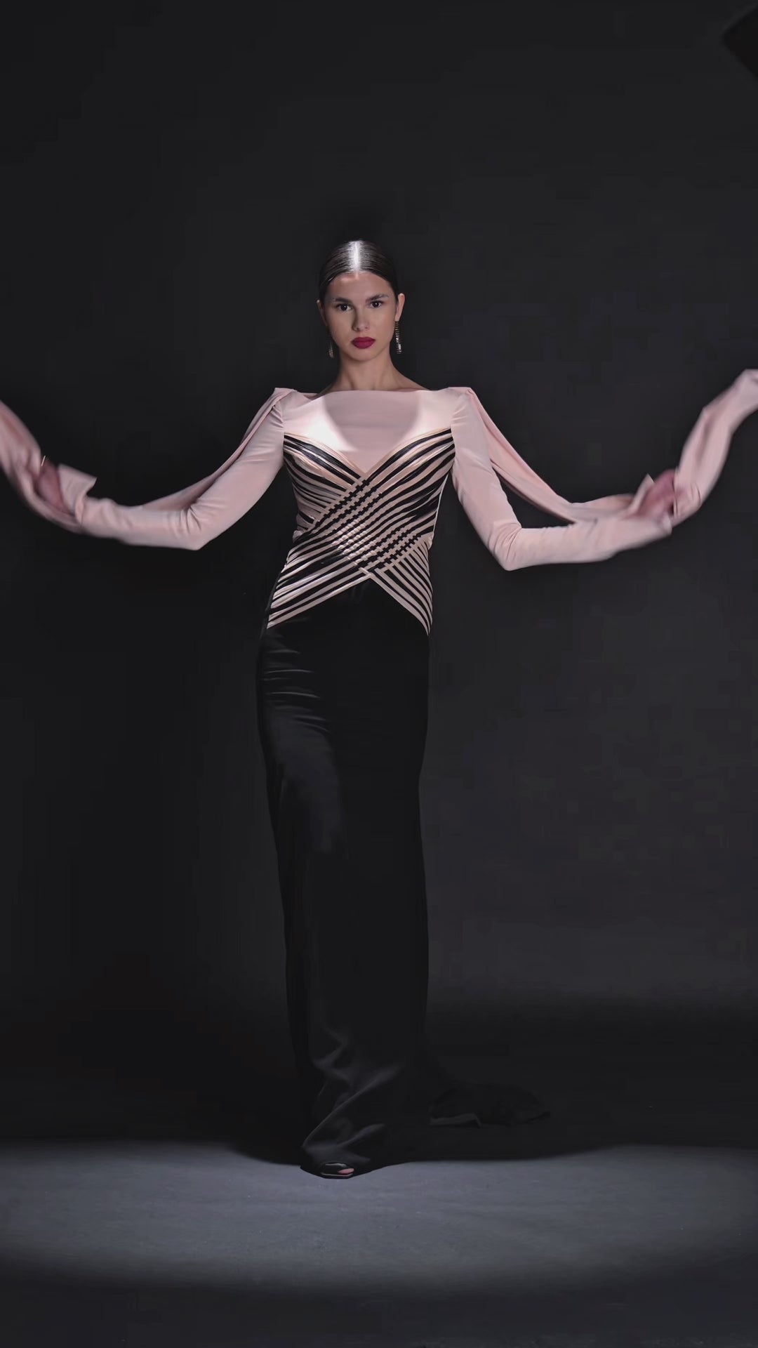 Look 36 – Blush & Black Geometric Corset Gown with Draped Sleeves