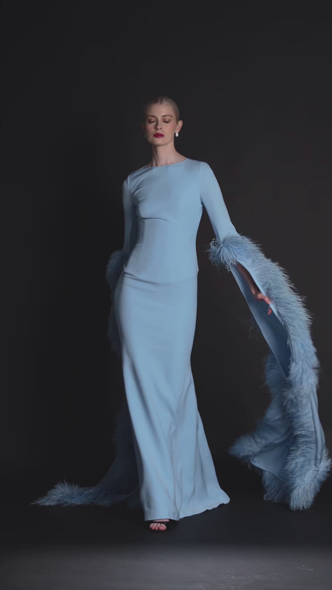 Look 29 – Sky Blue Feather-Trimmed Statement Gown