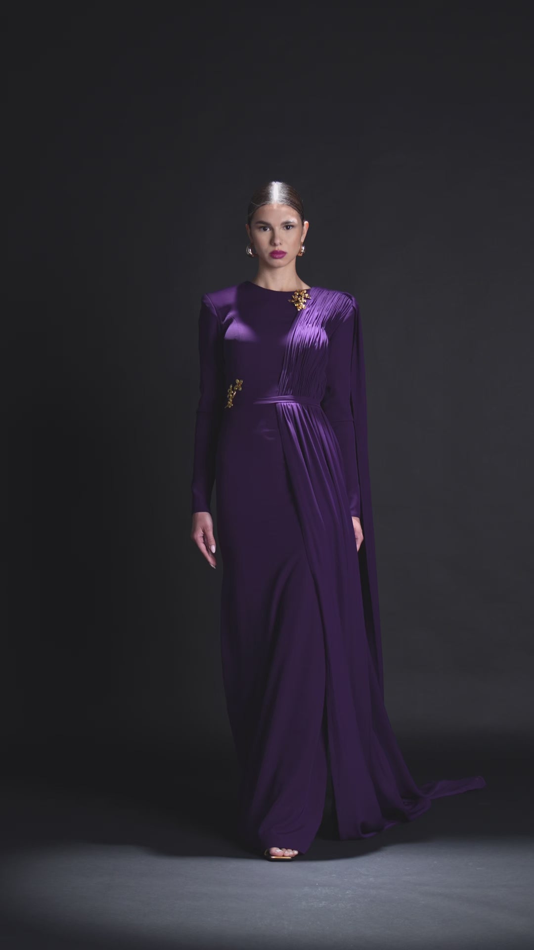 Look 31 – Regal Purple Draped Gown with Gold Embellishments